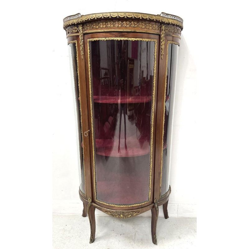 A curved display cabinet in the Napoleon III style, made of mahogany and veneer, 20th century