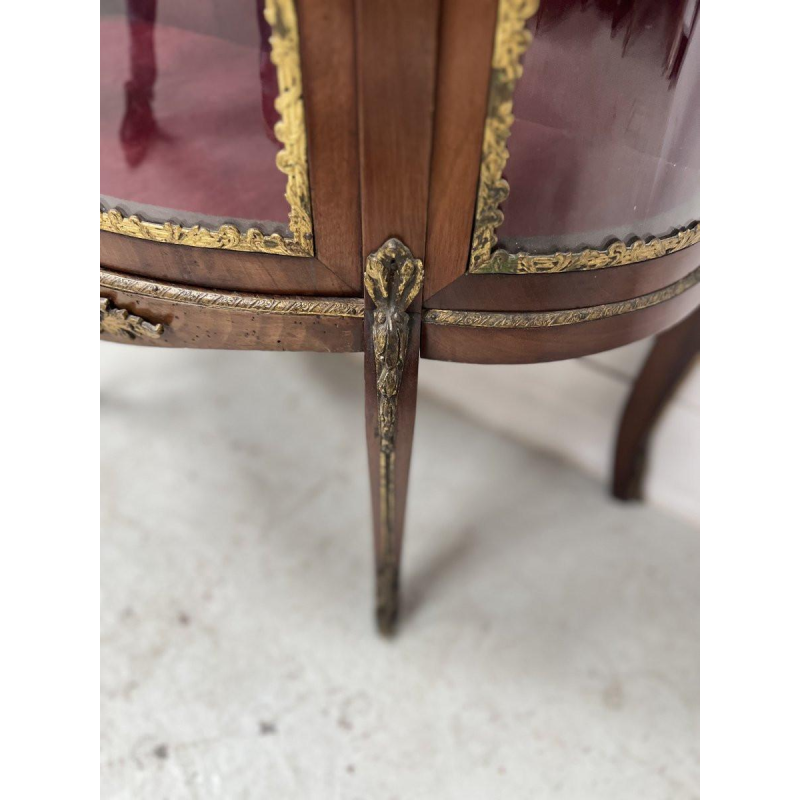 A curved display cabinet in the Napoleon III style, made of mahogany and veneer, 20th century