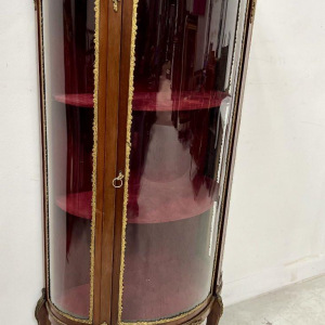 A curved display cabinet in the Napoleon III style, made of mahogany and veneer, 20th century