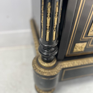 Napoleon III style cabinet with one door, in ebonized wood and brass marquetry, 19th century
