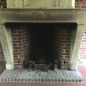 Antique fireplace with overmantel, Burgundy stone, late 17th – early 18th century