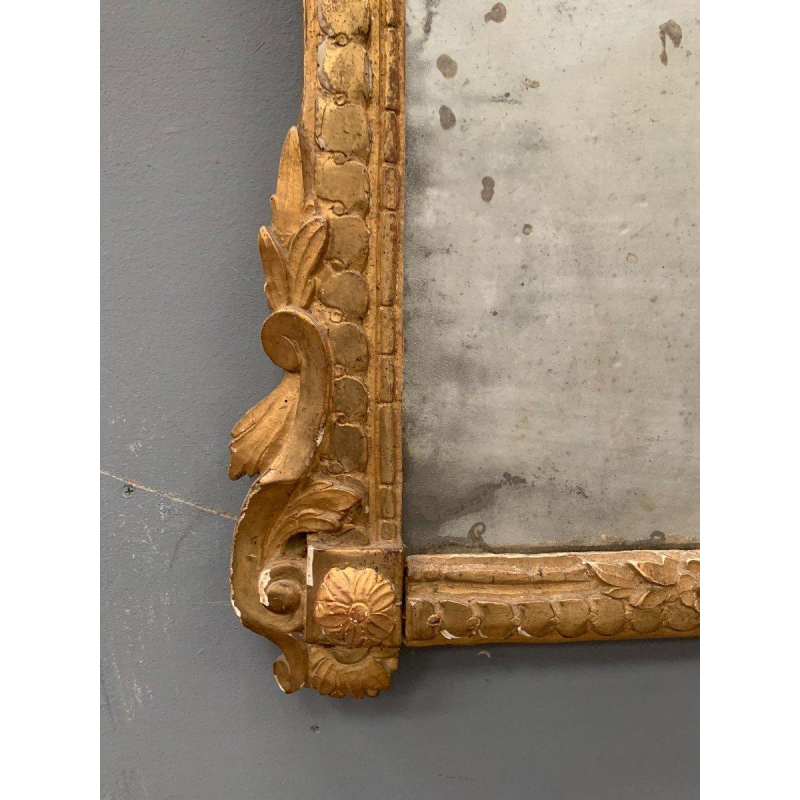 Louis XVI period mirror in giltwood, 18th century