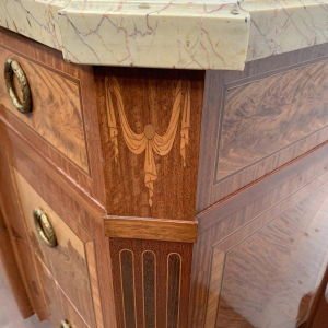 Transition style commode with central projection, amaranth and rosewood, 20th century