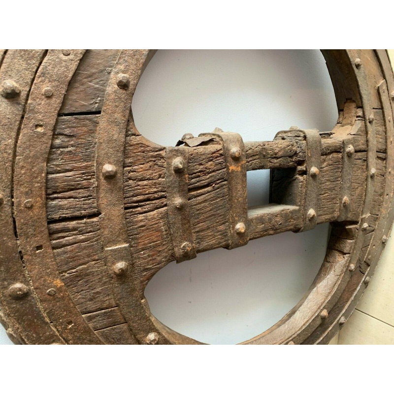 Set of two riveted wrought iron chariot wheels, 16th century