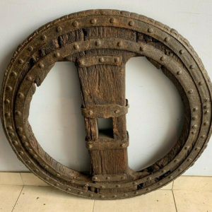 Set of two riveted wrought iron chariot wheels, 16th century