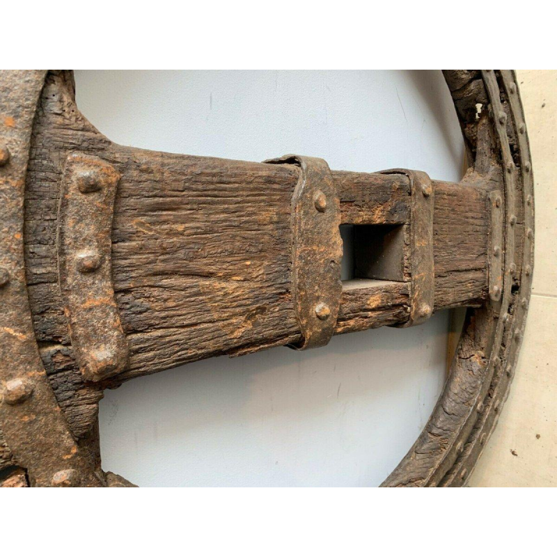 Set of two riveted wrought iron chariot wheels, 16th century