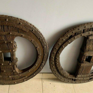Set of two riveted wrought iron chariot wheels, 16th century