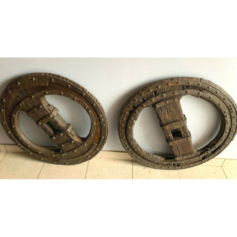 Set of two riveted wrought iron chariot wheels, 16th century