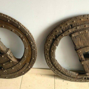 Set of two riveted wrought iron chariot wheels, 16th century