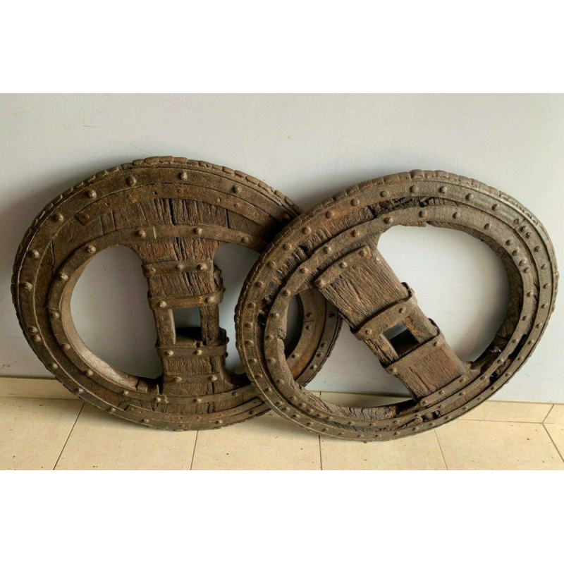 Set of two riveted wrought iron chariot wheels, 16th century