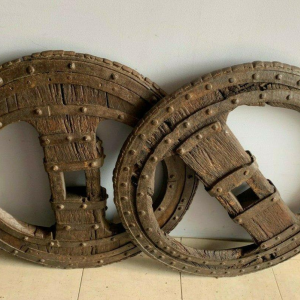 Set of two riveted wrought iron chariot wheels, 16th century
