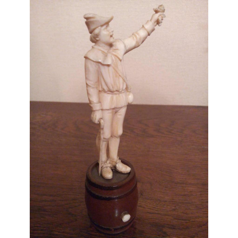 "Man with a rose" ivory figure sculpture, wooden barrel base, Nuremberg 18th c
