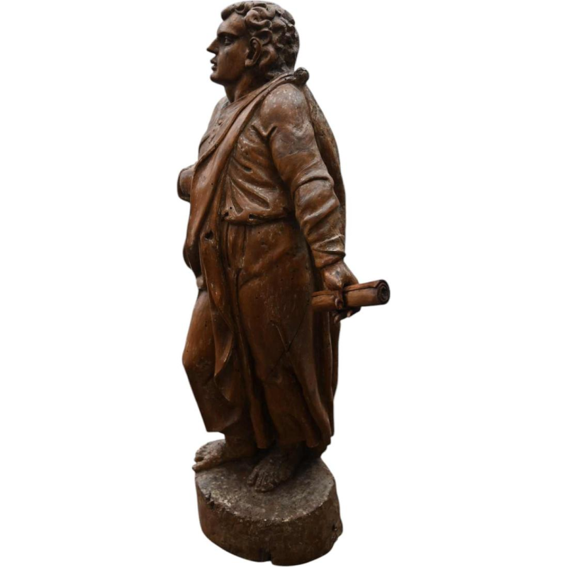 Fruitwood sculpture of a judge or magistrate, 17th century statue