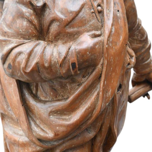Fruitwood sculpture of a judge or magistrate, 17th century statue