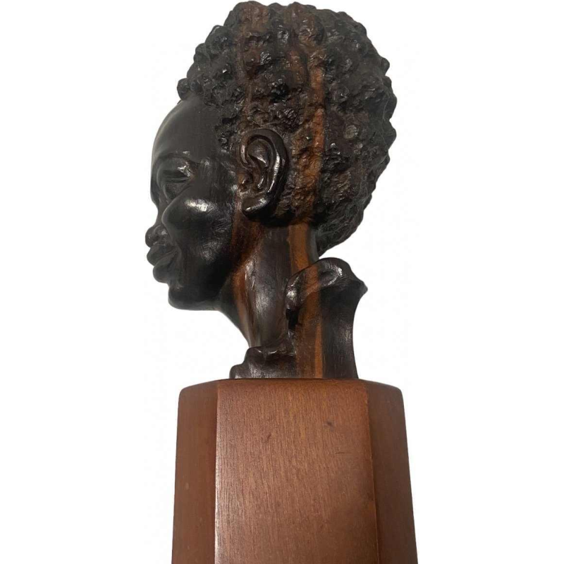 Young African woman's head macassar wood signed R.v.d Bael