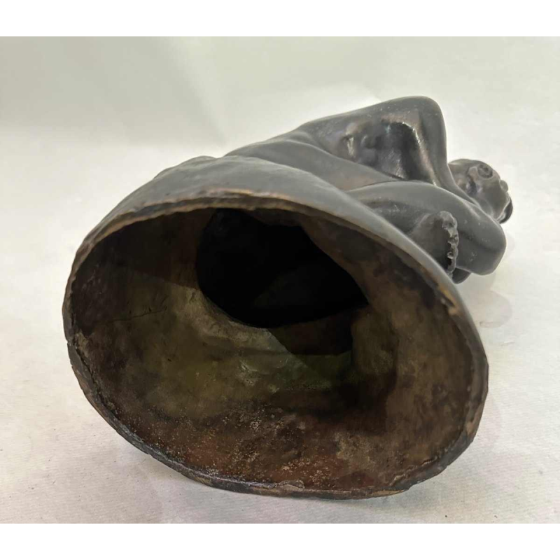 Antique bronze sculpture in the style of Rodin's The Thinker