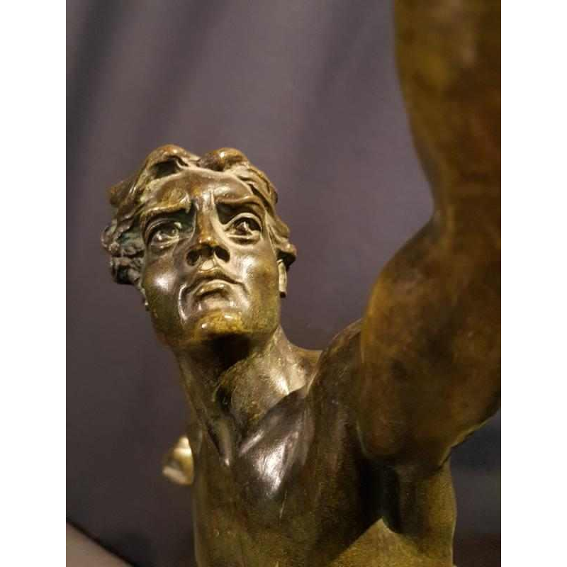 Lemoyne "Porteur de la flamme" bronze sculpture with green patina