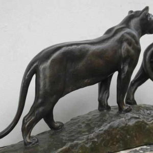 Pair of bronze lionesses by Louis Riche, French sculptor