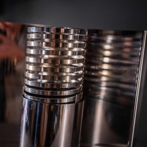 Pair of ' Spiral / Spring ' wall light sconces, chromed steel, Space Age ca 1970