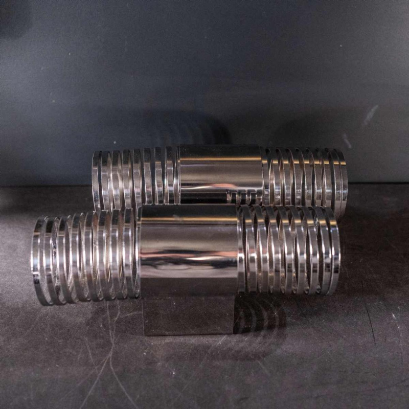 Pair of ' Spiral / Spring ' wall light sconces, chromed steel, Space Age ca 1970