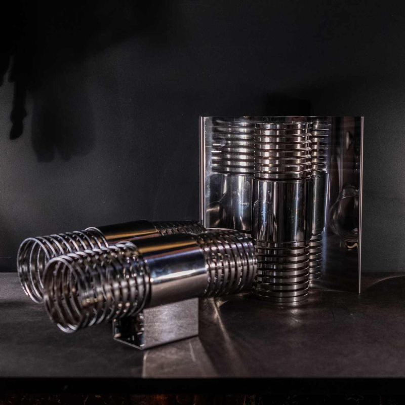 Pair of ' Spiral / Spring ' wall light sconces, chromed steel, Space Age ca 1970