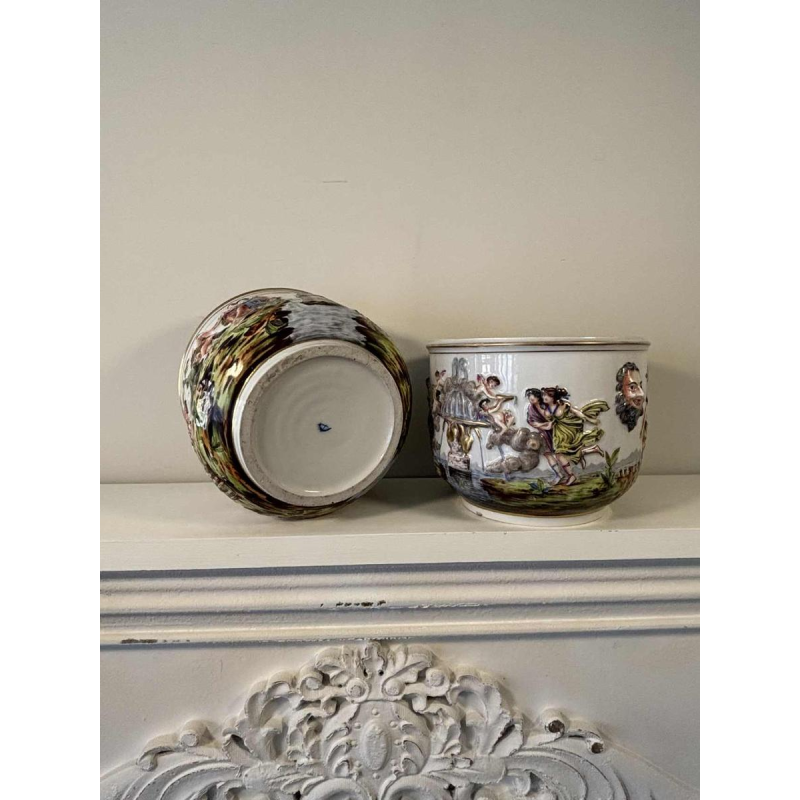 Capodimonte, pair of planters, polychrome enamelled porcelain, antique scenes decoration in bas-relief, 19th c