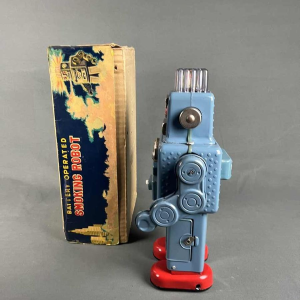 Smoking Spaceman Robot en métal bleu dans sa boite d'origine, Yonezawa Japon ca 1960