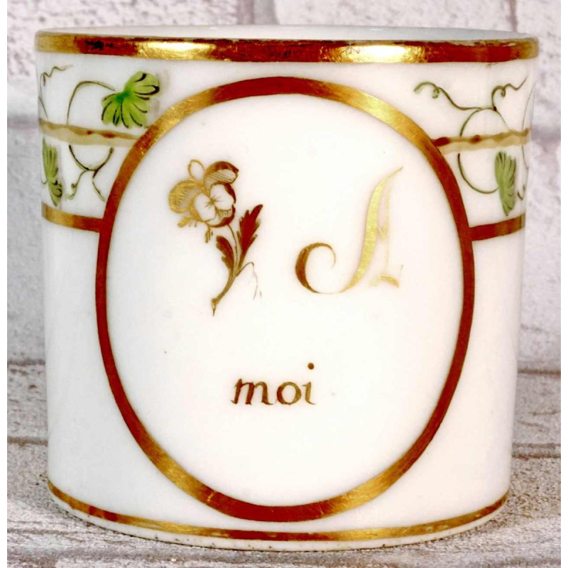 Paris porcelain, cup and saucer with rebus decoration, 18th c