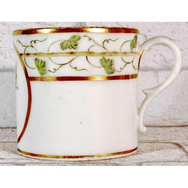 Paris porcelain, cup and saucer with rebus decoration, 18th c