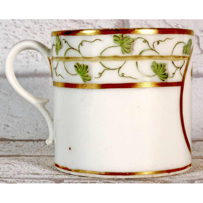 Paris porcelain, cup and saucer with rebus decoration, 18th c