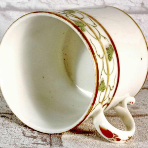 Paris porcelain, cup and saucer with rebus decoration, 18th c