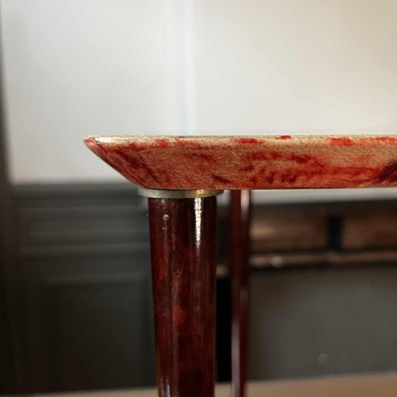 ALDO TURA, coffee/side table in red lacquered goatskin parchment, Italy ca 1950