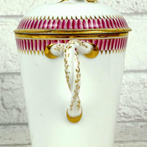 Paris porcelain covered trembling cup and saucer, late 18th century