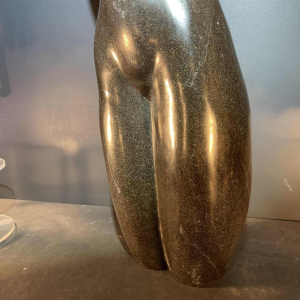 Abstract sculpture femme nue in stone (black marble), signed, 20th century