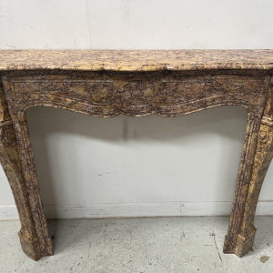 Louis XV style fireplace, Pompadour model, speckled breccia marble, 19th century