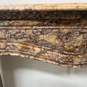 Louis XV style fireplace, Pompadour model, speckled breccia marble, 19th century