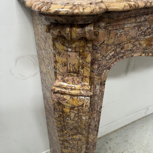 Louis XV style fireplace, Pompadour model, speckled breccia marble, 19th century