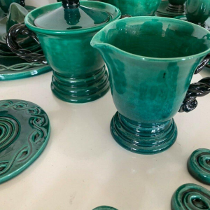 Marius Giuge, green glazed stoneware coffee and tea service, 20th century