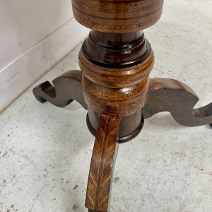 Octagonal Napoleon III marquetry pedestal table with a central tripod base, Italy, 19th century