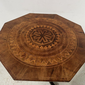 Octagonal Napoleon III marquetry pedestal table with a central tripod base, Italy, 19th century