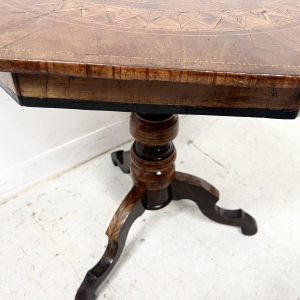 Octagonal Napoleon III marquetry pedestal table with a central tripod base, Italy, 19th century