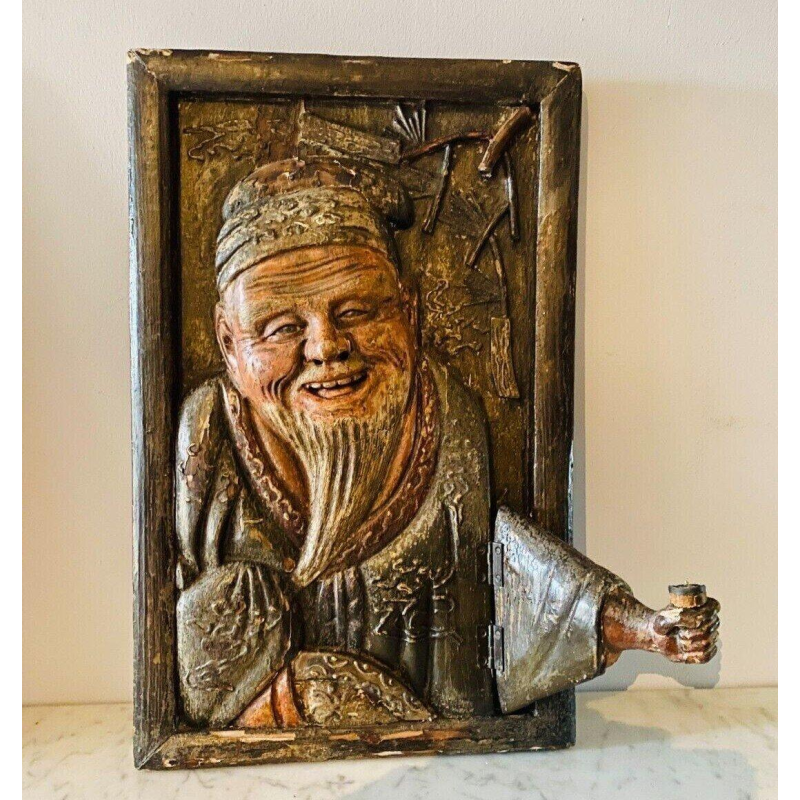 Pair of carved wooden wall sconces decorated with Chinese figures, 20th century