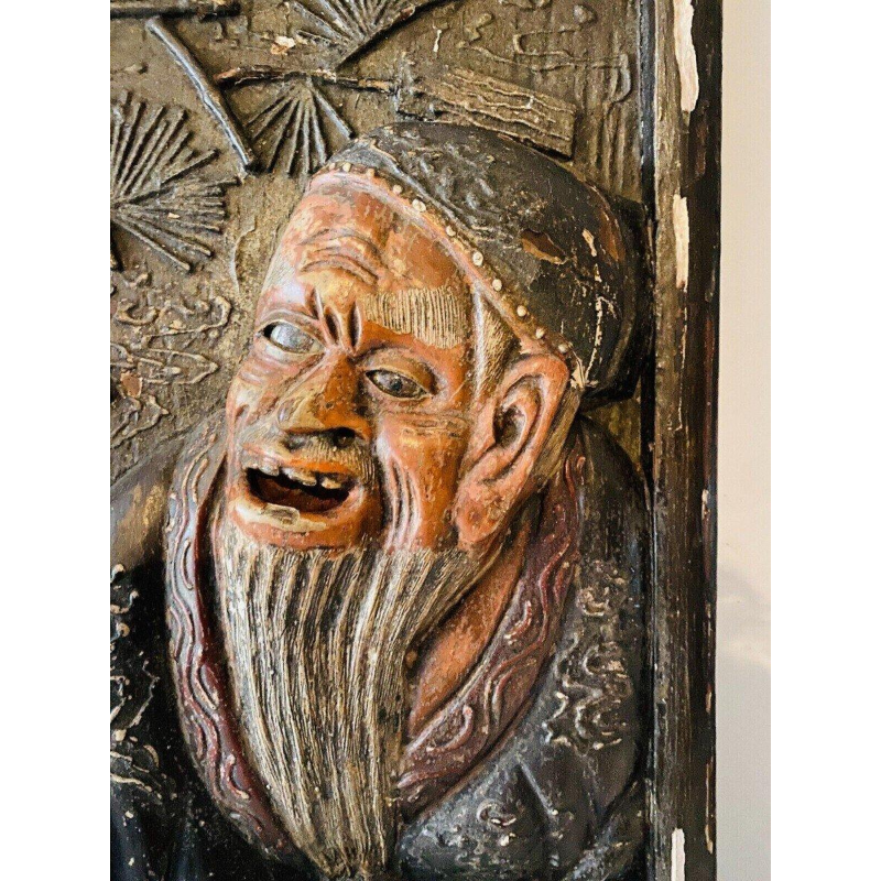 Pair of carved wooden wall sconces decorated with Chinese figures, 20th century