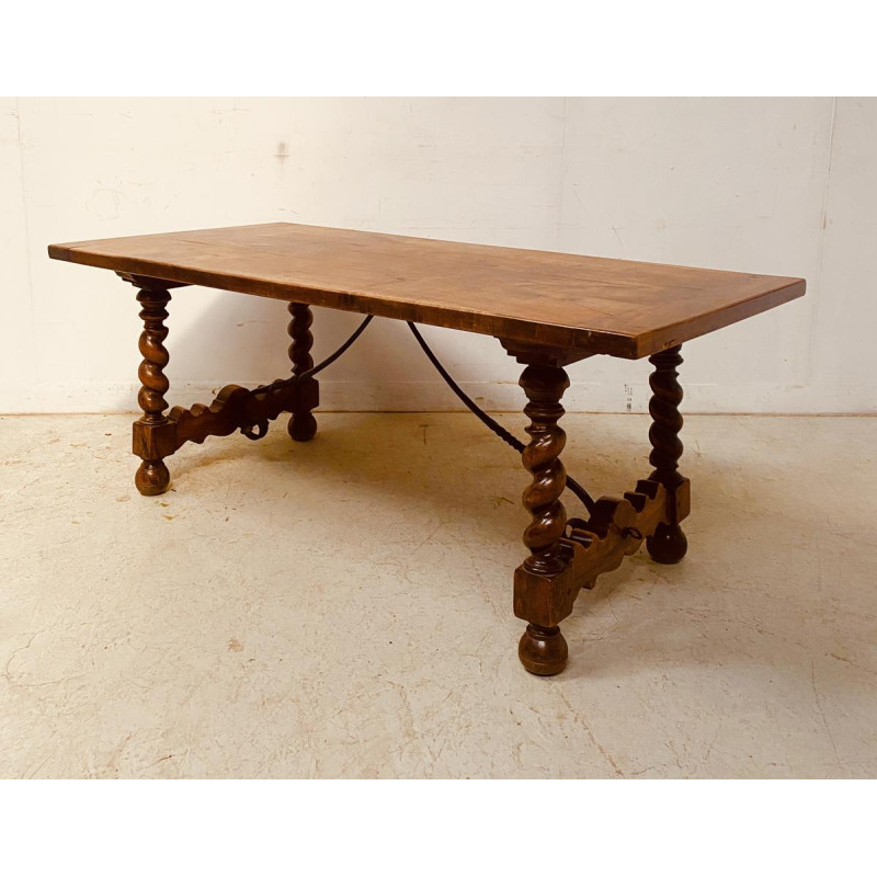Monastery table in solid walnut, hammered iron stretcher, twisted legs, 19th century