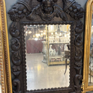 Miroir d'apparat au putto et dauphins - France ou Allemagne - XVIIIe siècle