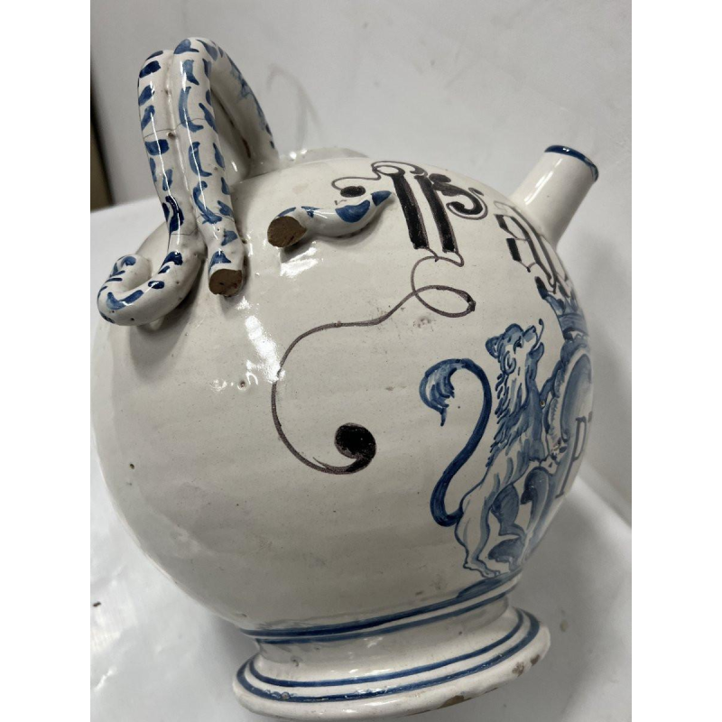 Blue and white earthenware vase with handles, 19th century