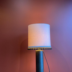 Copper "hot water bottle" lamp with Ashoka Silk lampshade and tassels from HOULES