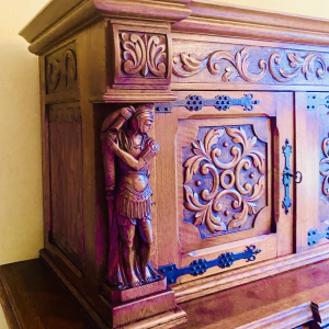 A Renaissance-style sideboard in richly carved solid oak, 20th century