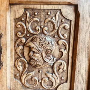 A Renaissance-style sideboard in richly carved solid oak, 20th century