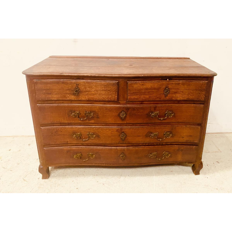 Commode Louis XV en chêne massif comportant cinq tiroirs, XVIIIe siècle